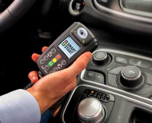 Smart Start Ignition Interlock Held in Vehicle